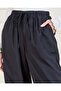 Women Black Solid Wide Leg Casual Trouser - 4