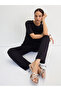 Black Asymmetrical Knit Top And Pants Co-Ords - 6