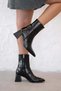 Olai Women's Wrinkled Patent Leather Heeled Boots Black