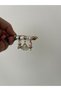 Gold Charm Detailed Steel Bracelet – Stylish Design with Flower & Fan & Rabbit Figures - 2
