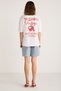 Luck Women's White T-Shirt with Red Lettering Detail on the Front and Back - 6