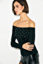 Glimmer women's black blouse with carmen collar, off-the-shoulder design, stretch fabric, and stone embellishments.