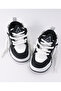 أحذية كاجوال برباط مثقب - أسود وأبيض