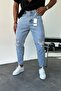 Boyfriend men's ice blue jeans trousers with ripped details Mz077