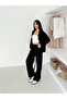طقم رياضي نسائي مريح من القماش المرن بسحاب - 4