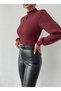 Women's balloon sleeve blouse with teardrop detail at the front in stretchy knitted fabric