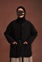 سترة مبطنة من تينسلسوفت باللون الأسود