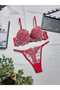 Floral and heart-embellished push-up bra and panty set.