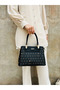 A Timeless and Versatile Handbag That Combines Everyday Chic and Elegance on the Go.