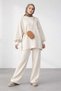 Cream-colored, balloon sleeve, wide-leg women's knitted modest outfit (top and bottom).