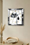 ساعة حائط ديكورية من MDF بإطار فضي وتصميم زهور سوداء - 5