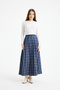 Women's Long Plaid Skirt with Pockets and Button Detail