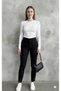Off-white round neck soft textured molded fabric stretchy Slim Fit bodysuit.