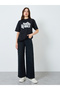 Women Black Oversized Graphic Print T-Shirt - 2