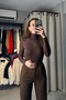Turtleneck Blouse with Tulle Detail on the Chest