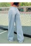 Women's Low Waist Denim Pants with Rips - 3