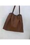A leather bag with a unique design
