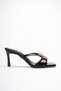Reyina Black Patent Leather Women's Mule Sandals with Gold Buckle Detail and 9 cm Heel.