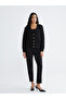 Black slim fit women's pleated pants from plus-store