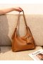 Luméa Model Women's Adjustable Hand, Arm, and Shoulder Bag with Soft Leather Wallet Detail