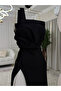 Elora's black one-shoulder dress with an architectural cut - 4