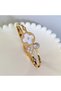 Gold steel symbol bracelet