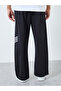 Men Black Striped Oversized Joggers - 4