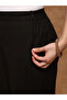 Women Black Embroidered Hem Pants - 6