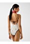 Guessxns Women's Swimsuit - 2