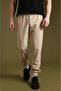 Men's Beige Parachute Fabric Sweatpants |   Sports Model with Elastic Cuffs, Zipper and Back Pocket