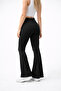 High-Waisted Leggings with Pocket Details and Flared Legs in Spanish Style. - 3