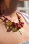 Red stone handmade rope necklace with gold detail
