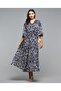 Patterned Maxi Dress with V-Neck and Flutter Sleeves
