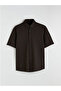 Artı-Store Men's Shirt Is Short-Sleeved and Closes with a Button on the Front. Button Detail on the Collar as Well