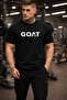 تي شيرت أسود مريح بتصميم شعار GOAT