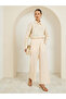 Women Off-White Embroidered Wide Leg Trousers