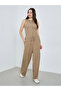 Women Beige Textured Wide Leg Trousers