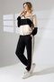 Hooded two-piece suit with elastic waist and zip cuffs