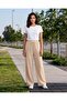 Women Beige Solid Trousers - 2