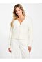 Fuzzy cable-knit cardigan