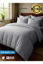 طقم لحاف فندقي من 4 قطع، مقاس 140×200 سم - تصميم مخطط من الألياف الدقيقة