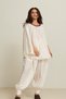 Cream-Colored Halter Neck Blouse with Accessories and Sleeve Details, Flowy and Comfortable Cut. - 4