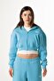 Flaw Embroidered Blue Zip Crop