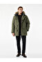 Long Sleeve Hooded Parka with Flap Pockets and Zipper Closure in Faux Fur
