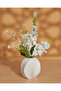 Artificial Plant And Flowers In White Ceramic Pot