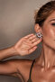 أقراط فضية اللون برمز الشمس العرقي - 2