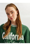 سويت شيرت مطبوع برقبة دائرية وأكمام طويلة