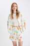 قميص Coool Oversize Fit منقوش بأكمام قصيرة وياقة بيجامة D5117ax24hs - 7