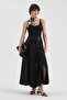 Women's Long Skirt with Front Zipper and Slit Detailed Design