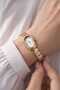 Gold Color Oval Case Curved Metal Strap Women's Wristwatch